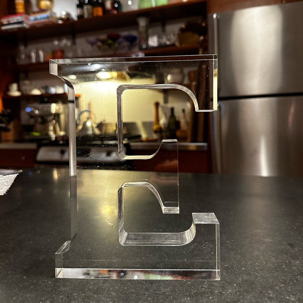Clear acrylic “E” letter